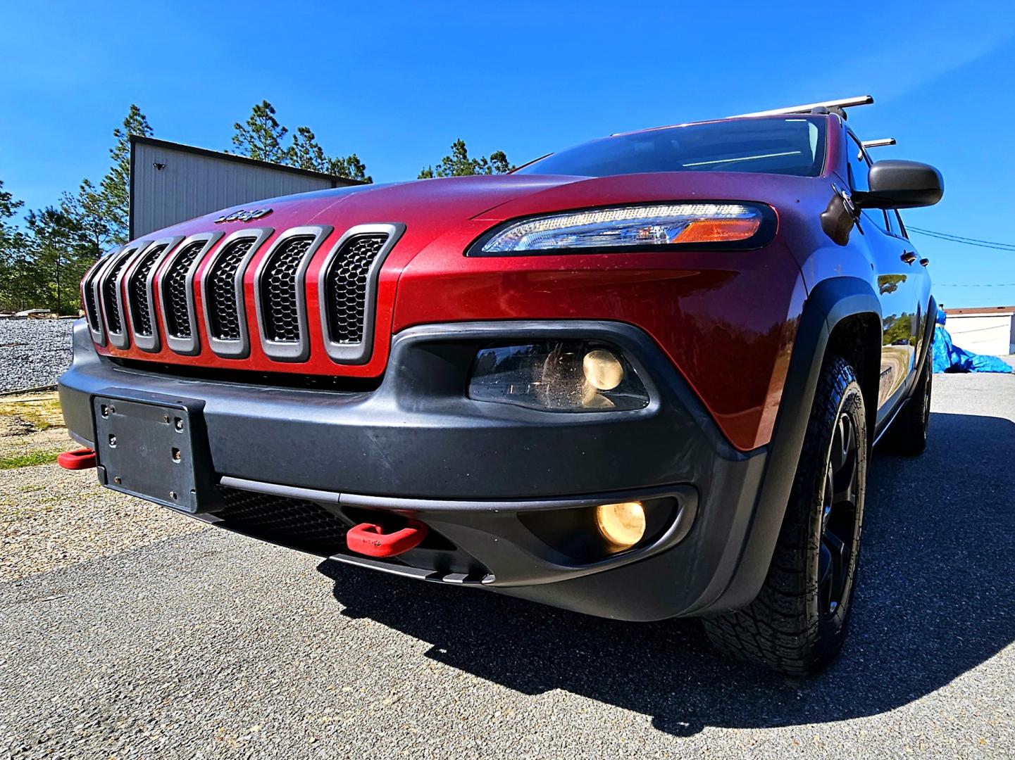 2014 Red Jeep Cherokee Trailhawk 4WD (1C4PJMBS2EW) with an 3.2L V6 DOHC 24V engine, 9-Speed Automatic transmission, located at 18001 Kellogg Rd, Saucier, MS, 39574, (228) 832-1441, 39.421459, -76.641457 - Photo#31